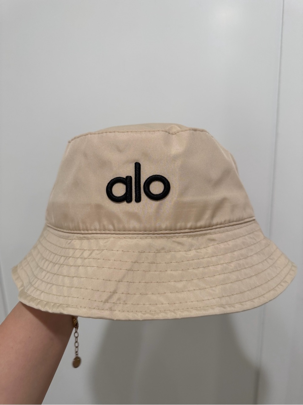 ALO Yoga Kids Beige Bucket Hat with Black Logo